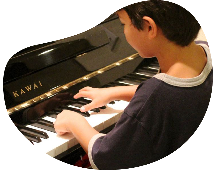 A child learns piano